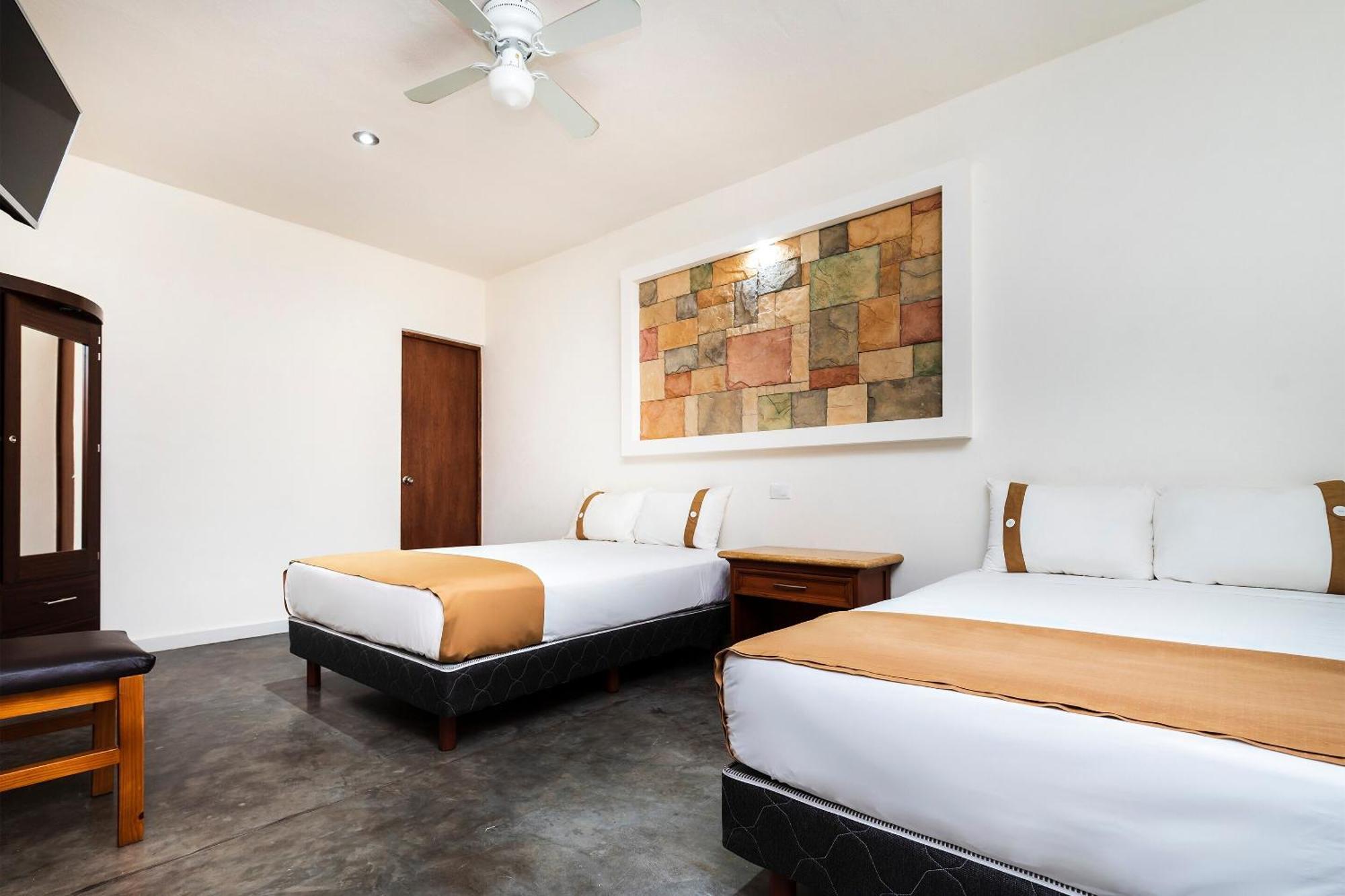 Capital O Hotel Joyma Suites, San Luis San Luis Potosi Bagian luar foto