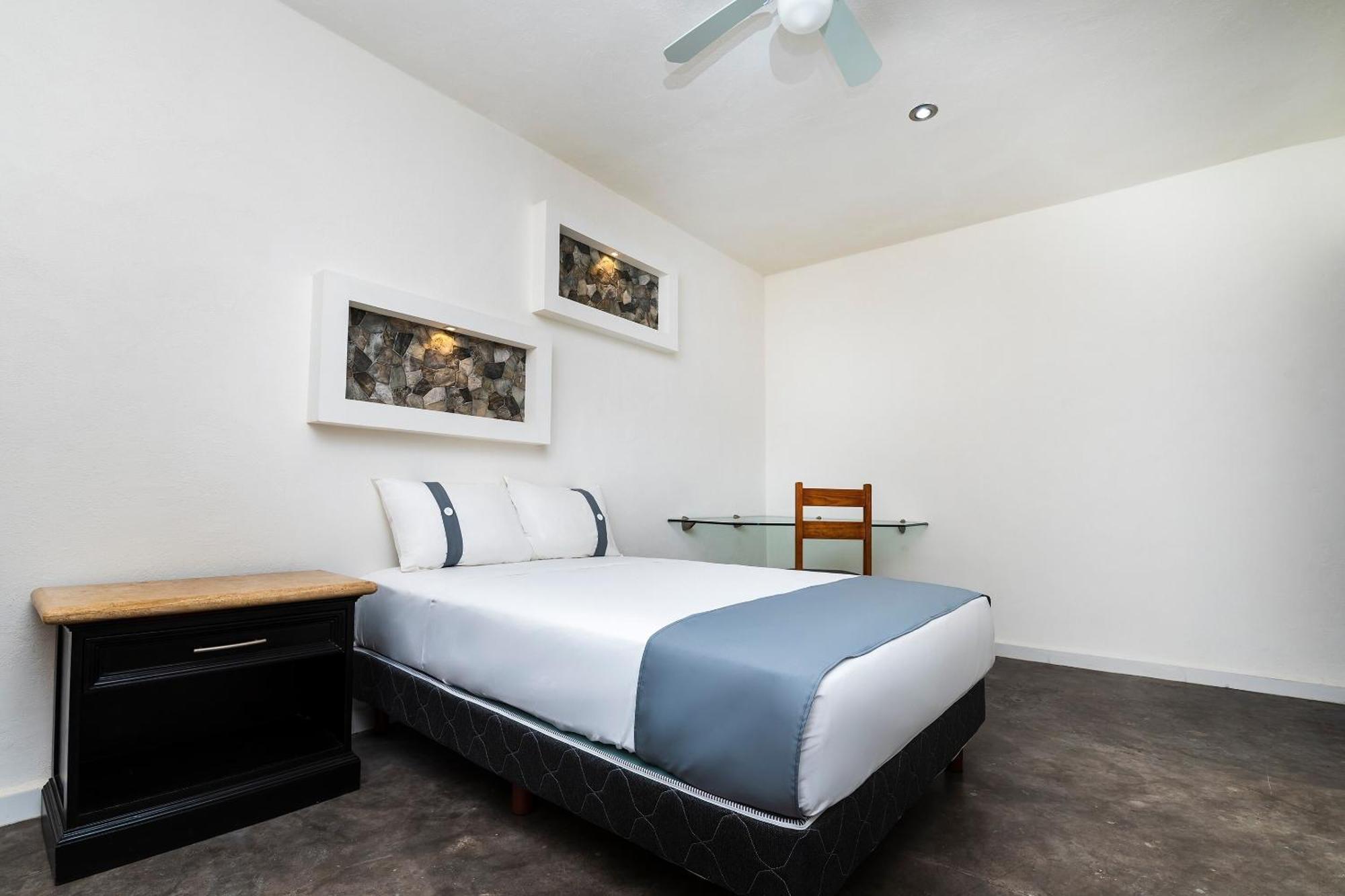 Capital O Hotel Joyma Suites, San Luis San Luis Potosi Bagian luar foto
