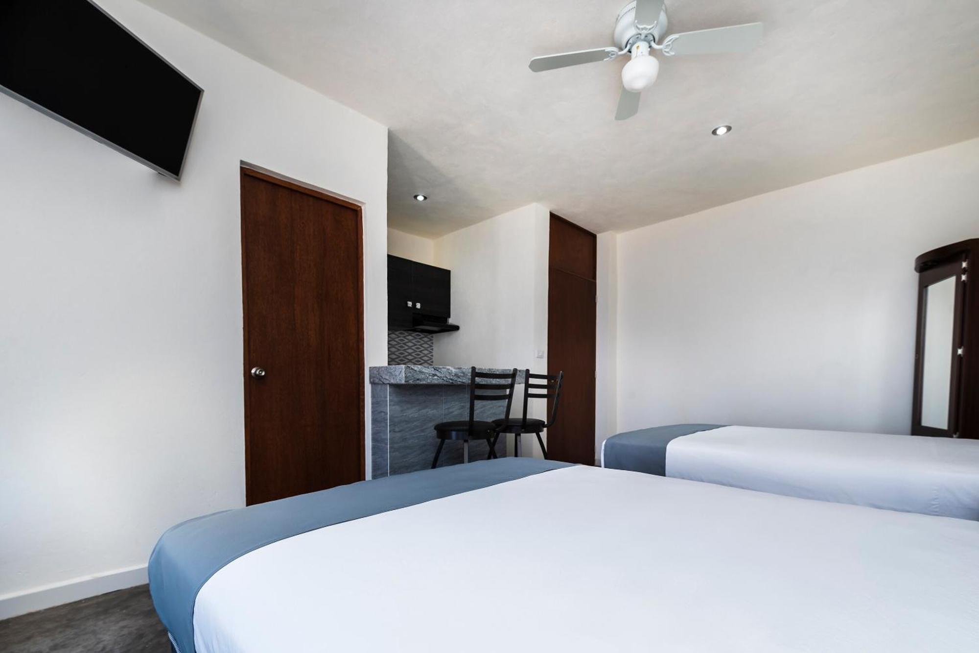 Capital O Hotel Joyma Suites, San Luis San Luis Potosi Bagian luar foto