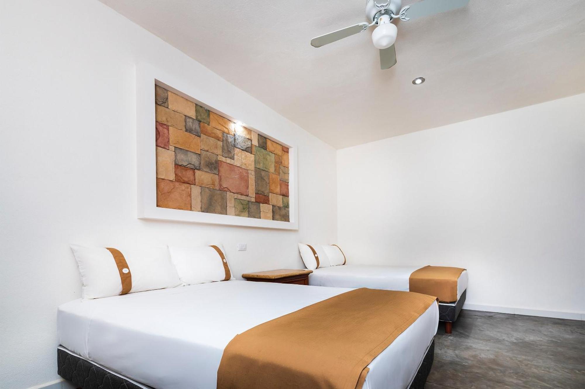Capital O Hotel Joyma Suites, San Luis San Luis Potosi Bagian luar foto