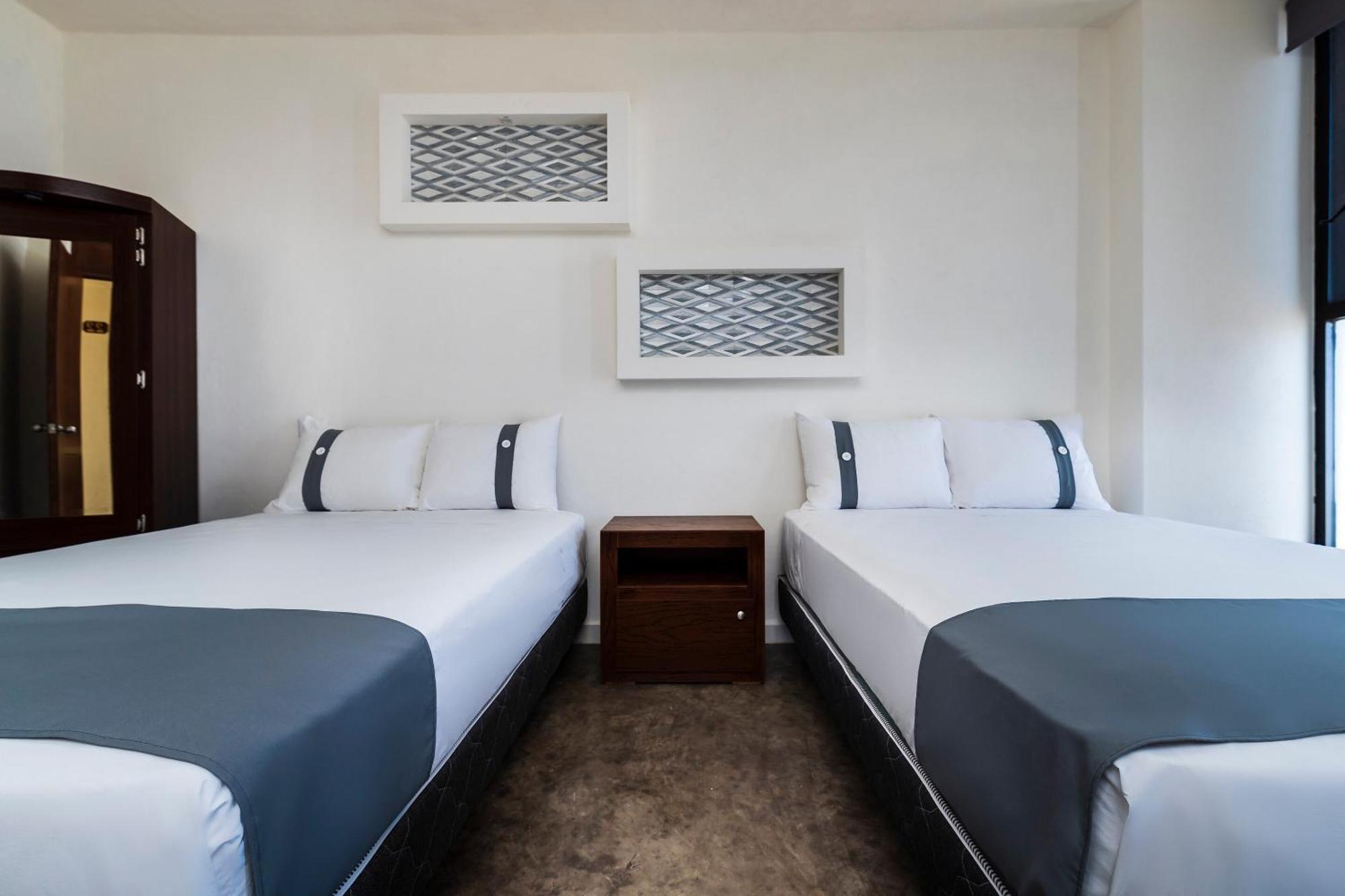 Capital O Hotel Joyma Suites, San Luis San Luis Potosi Bagian luar foto