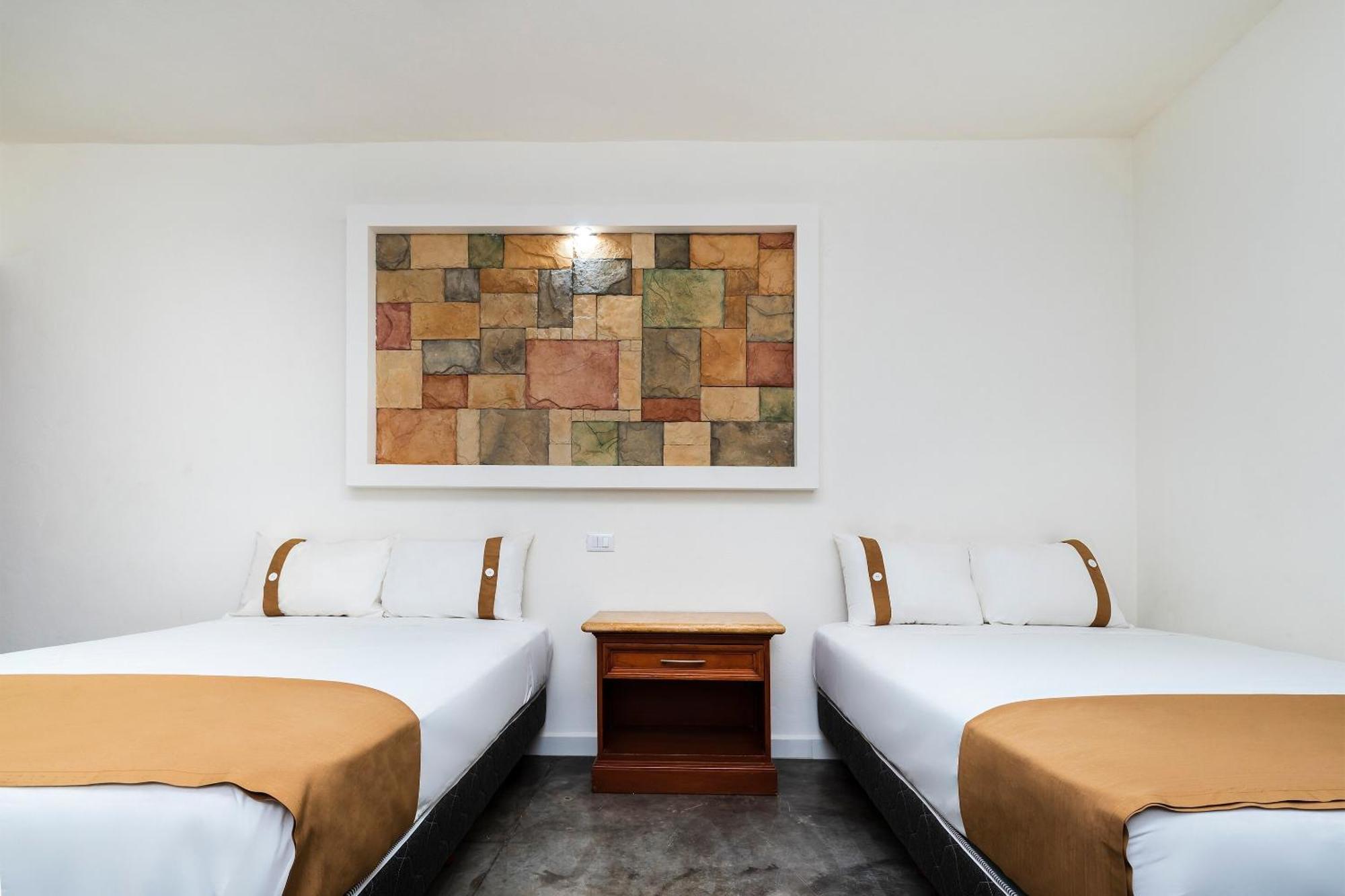 Capital O Hotel Joyma Suites, San Luis San Luis Potosi Bagian luar foto