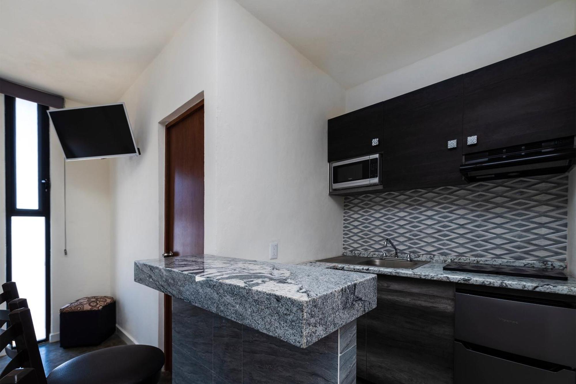 Capital O Hotel Joyma Suites, San Luis San Luis Potosi Bagian luar foto